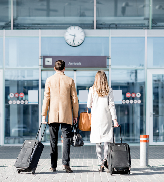 a couple arriving at the airport