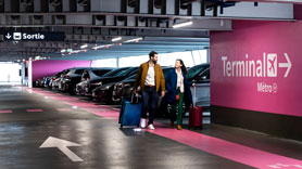 2 people in an official Paris airport parking lot